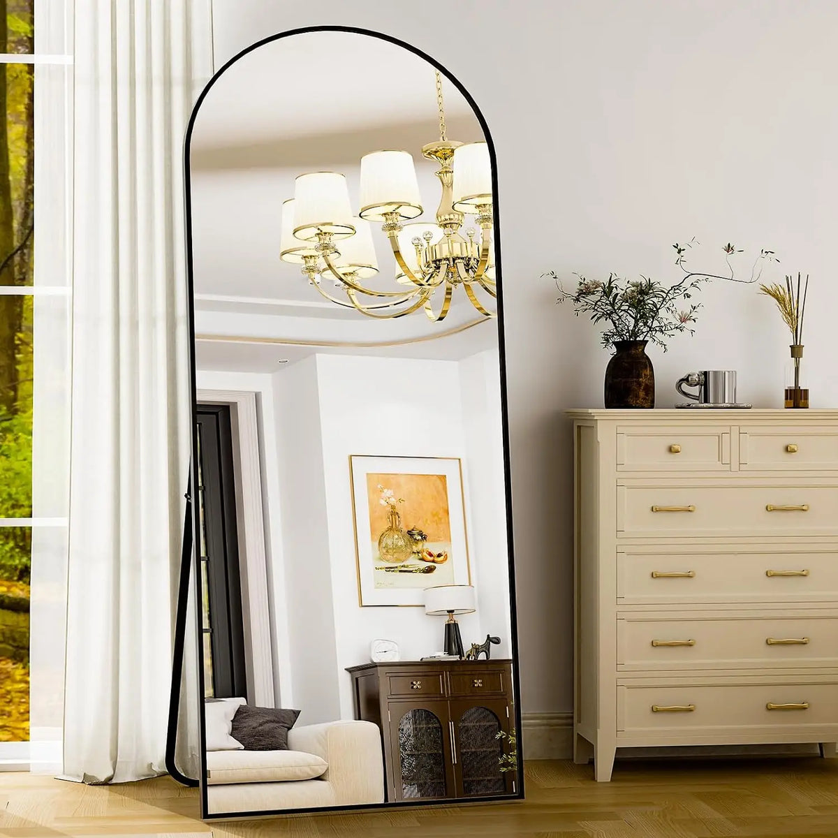 Arched mirror in a bedroom