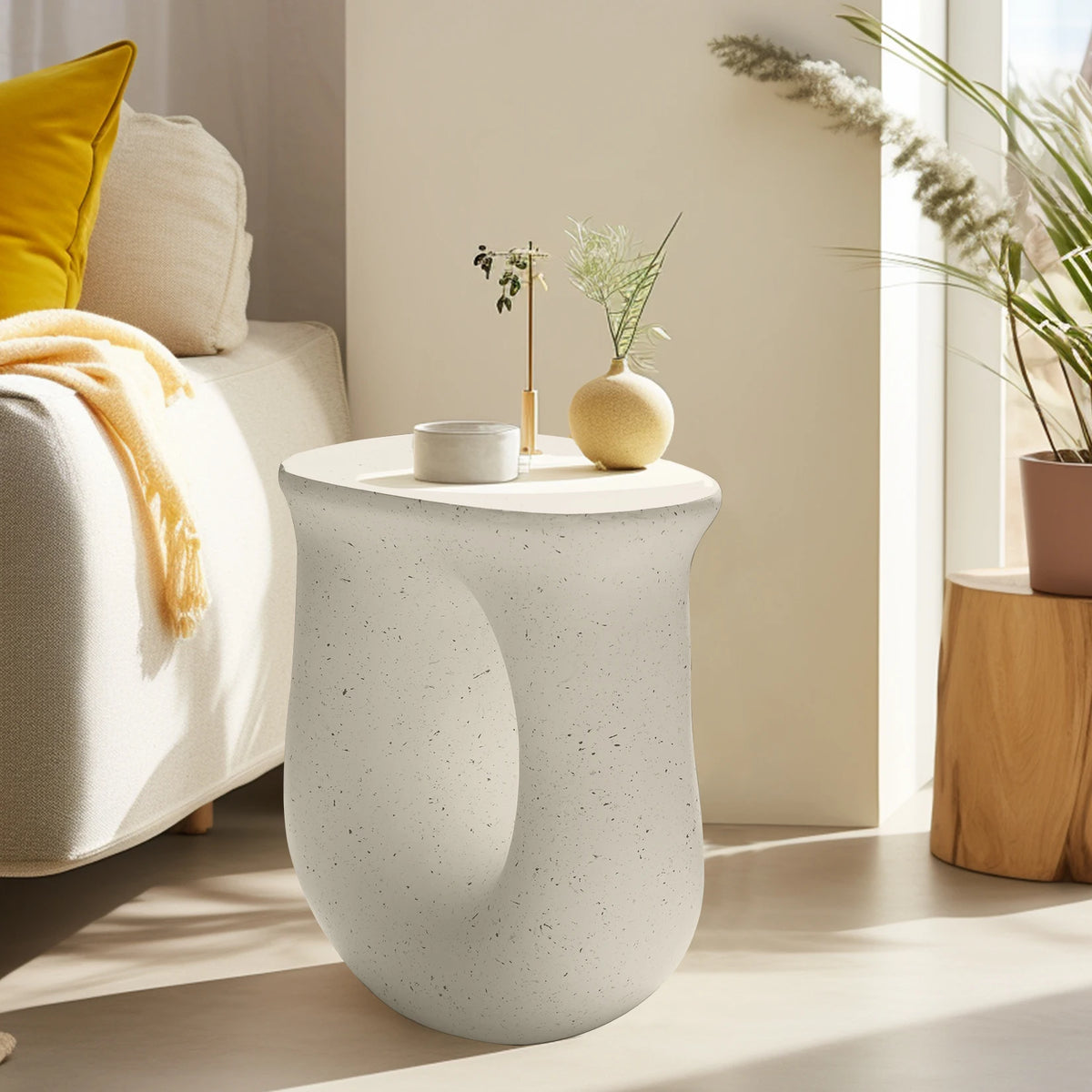 U-shaped side table next to a sofa
