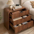 Nightstand with three drawers open