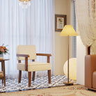 Mid-century armchair with walnut-tone frame and beige cushions