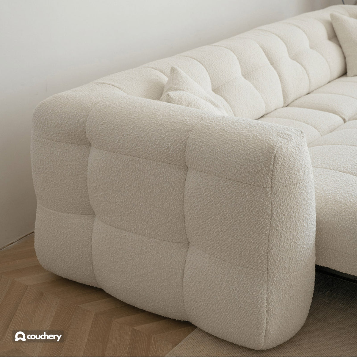 MallowNest rounded arm and tufting detail