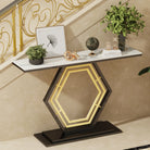 Hexagon console table styled in a staircase entryway