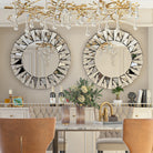 Sunburst wall mirror styled in an entryway