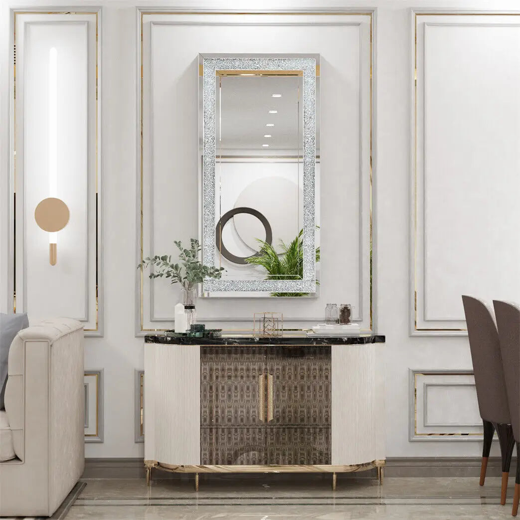 Crushed crystal mirror hung portrait above a cabinet