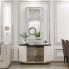 Crushed crystal mirror hung portrait above a cabinet