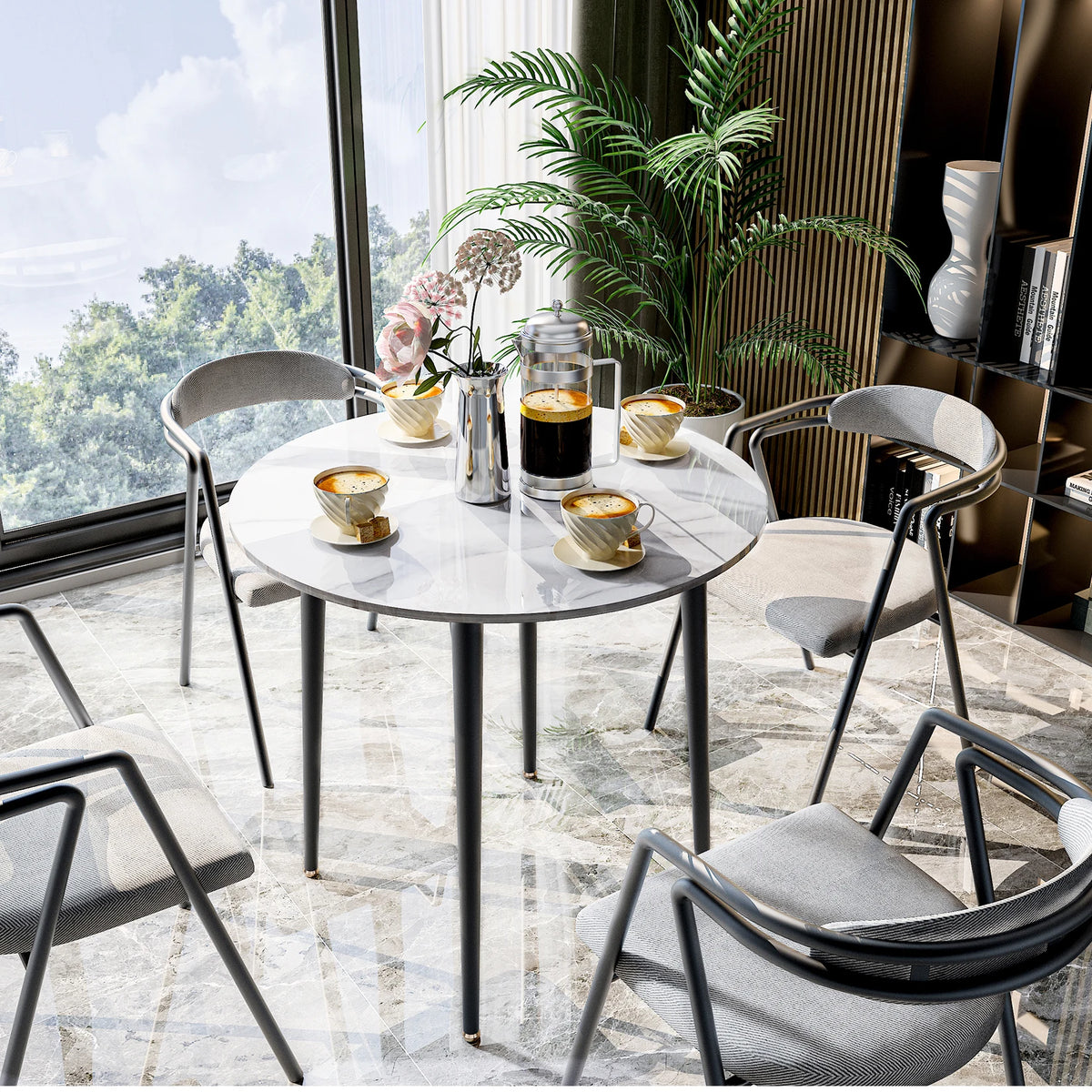 Round sintered stone table by a window