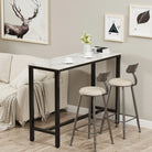 Counter height table behind a sofa